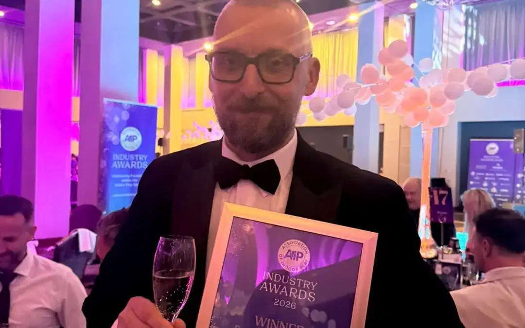 Milos wins Employee of the Year award in National Finals.